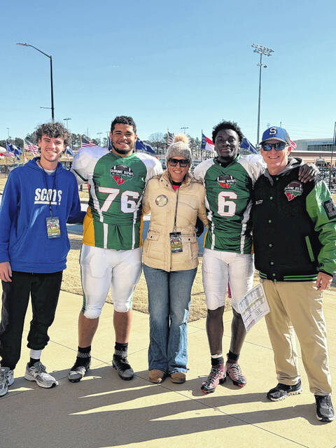 131164568_web1_Shrine-Bowl-Pic-1
From left to right: Carson Bailey, Isaiah Locklear, Laura Bailey, Dajuan Gibson and Richard Bailey at the Shrine Bowl of the Carolinas football game on Saturday in Spartanburg.
Courtesy Photo