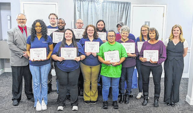 131202191_web1_Sonnax_group
Thirteen employees from Sonnax Transmission Co. in Laurinburg recently completed a yearlong leadership training program customized specifically for the company through Richmond Community College. Pictured are graduates of the program along with RichmondCC President Brent Barbee and the instructor, Angineeek Gillenwater.
Courtesy photo | Via RichmondCC