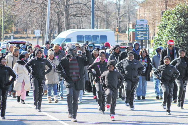 131228425_web1_IMG_3910
The Creative Expression Dance Academy led marchers down South Main Street Monday during the annual MLK March and Celebration organized by the Scotland County Branch of the NAACP.
