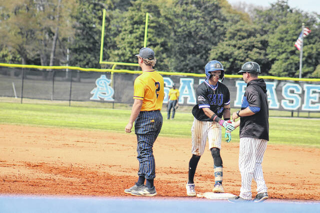 131402031_web1_IMG_4618
Cesar Morillo (14) stands on first base after getting a hit during the Knights win over CIU on Saturday afternoon at Clark Field. Morillo had eight hits over the three games in the series.
Andrew Smolar | The Laurinburg Exchange