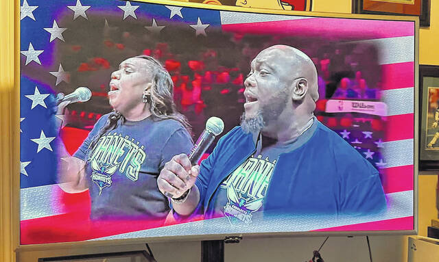 131413817_web1_David-and-Tiffany-Spencer-singing
Local Gospel duo David and Tiffany Spencer sing their rendition of the national anthem before the Charlotte Hornets game against the Utah Jazz at the Spectrum Center on March 31.
Courtesy photo