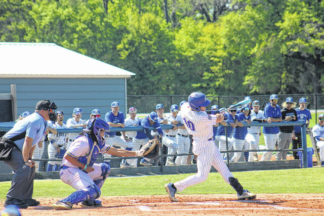 131429268_web1_IMG_4826
Aiden Wilson (10) puts the ball in play during the first inning of the Knights win over Morris on Wednesday afternoon at Clark Field. Wilson went 1-5 batting with an RBI, a run scored and a walk drawn.
Andrew Smolar | The Laurinburg Exchange