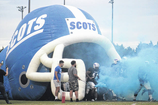 131450589_web1_IMG_0553
The Scotland football team released their 2025 season schedule on Thursday night. Here, the Scots run out of the tunnel prior to their home matchup with Marlboro County last season.
File Photo