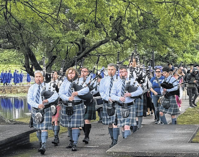 131492833_web1_thumbnail_IMG_5049
For the last time, the sonorous skirl of the bagpipes accompanied graduates as they traversed the causeway across the lake during St. Andrews Universitys final graduation ceremony held Sunday.
Stephanie Walcott | The Laurinburg Exchange