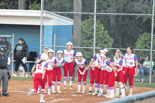 131494791_web1_IMG_5159
The Lady Scots softball team beat West Brunswick in the first round of the 3A NCHSAA state playoffs 10-0 on Tuesday night. Here, the Scots celebrate a grand slam by Addison Johnson (2). Johnsons four RBIs led the team.
Andrew Smolar | The Laurinburg Exchange