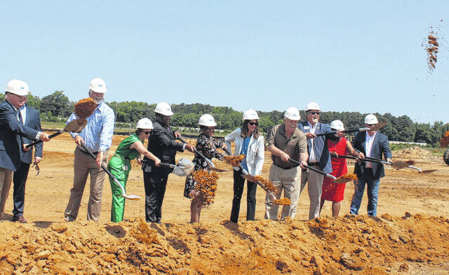 131559342_web1_IMG_5428
Laurinburg and Scotland County officials, along with representatives for Precision Contractors Inc. and The Golden Leaf Foundation, breaks ground Tuesday on a shell building that will be erected at the Scotland County Economic Development Corporations Incubator Park.