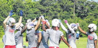 
			
				                                The Fighting Scots defense breaks down the huddle during seven on seven scrimmage, Wednesday, June 25.
                                 Travis Petty Jr | The Laurinburg Exchange

			
		