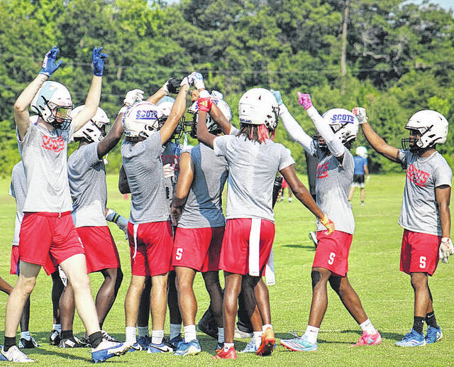 131608043_web1_Unity-Picture
The Fighting Scots defense breaks down the huddle during seven on seven scrimmage, Wednesday, June 25.
Travis Petty Jr | The Laurinburg Exchange