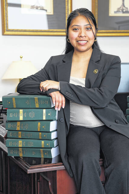 131655944_web1_Magally_03b
Magally Ortiz-Rojas, who graduated with summa cum laude honors in May at The University of North Carolina at Pembroke, was among four recent graduates of UNC System institutions selected to serve as a presidential scholar.
Courtesy photo | Via UNCP