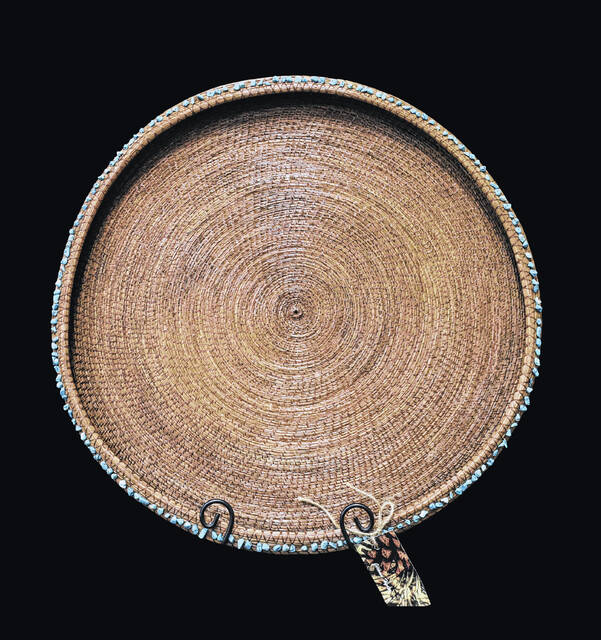 Shown is a pine needle basket that will be auctioned off at the Lumbee Tribes gala event.