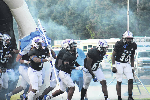 131730631_web1_IMG_9993
The Scots charge out of the tunnel-and later storm into the endzone for the game-winning touchdown to defeat Dillon, 36-33, in the season opener.
Travis Petty Jr | The Laurinburg Exchange