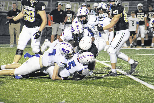 131794645_web1_IMG_0857
Scotland defenders swarm a Pincecrest running back during Fridays loss on Sept.19.
Travis Petty Jr | The Laurinburg Exchange