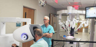 
			
				                                Guests try their hand at the Da Vinci 5 surgical robot during a guided demonstration at Scotland Memorial Hospital.
                                 Tomeka Sinclair | The Laurinburg Exchange

			
		