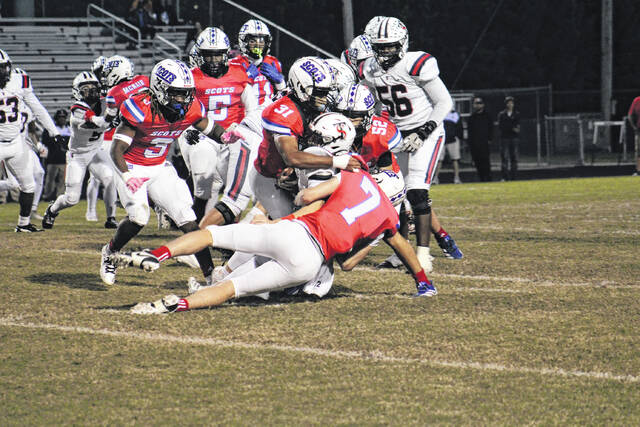 131842622_web1_IMG_1562
Scots defenders swarm a Terry Sandford ball carrier during Homecoming night action.
Travis Petty Jr | The Laurinburg Exchange