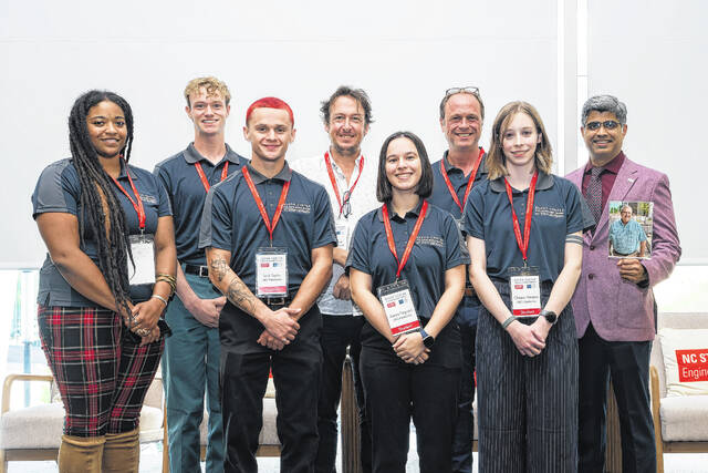 131878770_web1_Bezos-Center-Summit_group 
			
				                                Shown are Tonyetta Perry (left), Evan Phillips, Jack Taylor, Andy Jarvis, Alexis Pegram, Bryan Sales, Chiara Messex and Rohan Shirwaiker, co-director of the Bezos Center for Sustainable Proteins
                                 Courtesy photo | Via UNCP