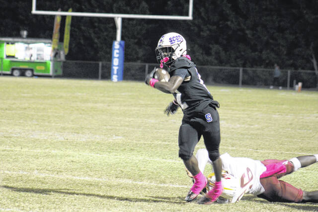 131910484_web1_IMG_1788
Junior Samier Pate fights through a tackle during Scotlands game against the Lumberton Pirates on Oct. 24, 2025 at Pate Stadium.
Travis Petty Jr | The Laurinburg Exchange