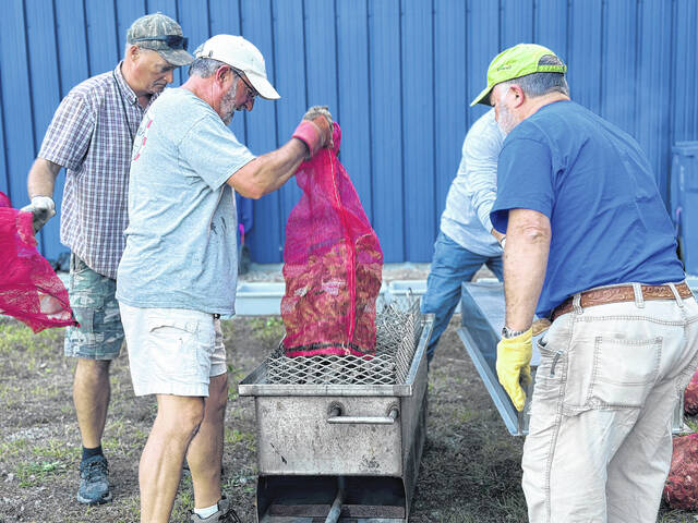 131923156_web1_Oyester-1
It was a packed house at the XP Training Center for the annual Laurinburg-Scotland County Area Chamber of Commerces Carolina Hearts Chamber on the Half Shell. All 500 tickets sold out for Saturdays event, which featured all-you-can-eat oysters, shrimp, chicken wings, and hushpuppies. Guests also enjoyed live music from Whiskey Pines. This year marked the first time the event was held at the XP Training Center, after previously taking place at St. Andrews Universitys Equestrian Center. The move came after the universitys closure in May. New volunteers were also on deck, as Scotland County Schools students stepped in to deliver oysters, which was a role previously filled by St. Andrews student-athletes.
Katelin Gandee | For the Exchange