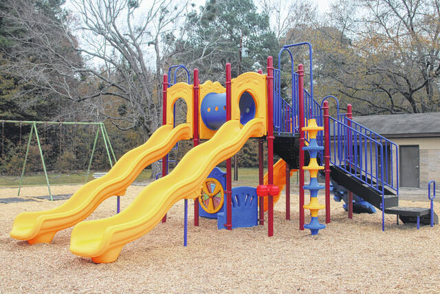 <p>Leaders from Scotland County and the Town of Wagram gather to celebrate the installation of new playground equipment funded through a state rural development grant.</p>
<p>Tomeka Sinclair | The Laurinburg Exchange</p>