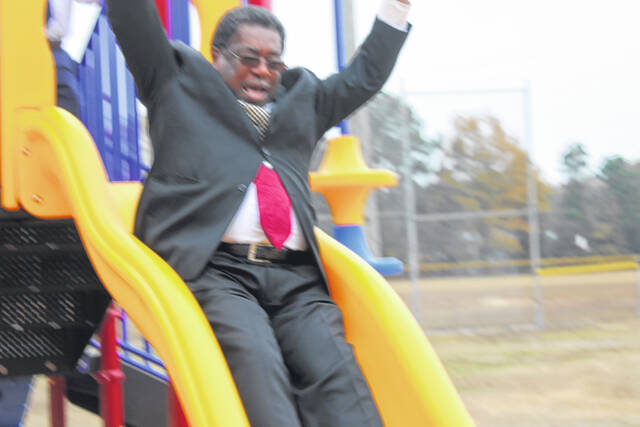 <p>Leaders from Scotland County and the Town of Wagram gather to celebrate the installation of new playground equipment funded through a state rural development grant.</p>
<p>Tomeka Sinclair | The Laurinburg Exchange</p>