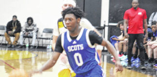 
			
				                                Scots junior guard Tomek McFadden (0) drives the ball in transition against Fairmont on Dec. 3, 2025.
                                 Travis Petty Jr | The Laurinburg Exchange

			
		