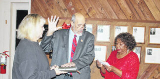 
			
				                                Town Clerk Elizabeth Anderson administered the oath to Mayor Archie Herring and Commissioners Marjorie Whitlock and Randy Pearson. Former N.C. Supreme Court Justice Michael Morgan administered the oath to newcomer Commissioner Michael Swinney.
                                 Tomeka Sinclair | The Laurinburg Exchange

			
		