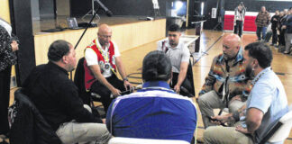
			
				                                Lumbee Tribal Chairman John Lowery, second from right, and the Dark Water Society play an honor song at a ceremony recognizing the anniversary of the Battle of Hayes Pond Friday in Pembroke.
                                 Chris Stiles | The Robesonian

			
		
