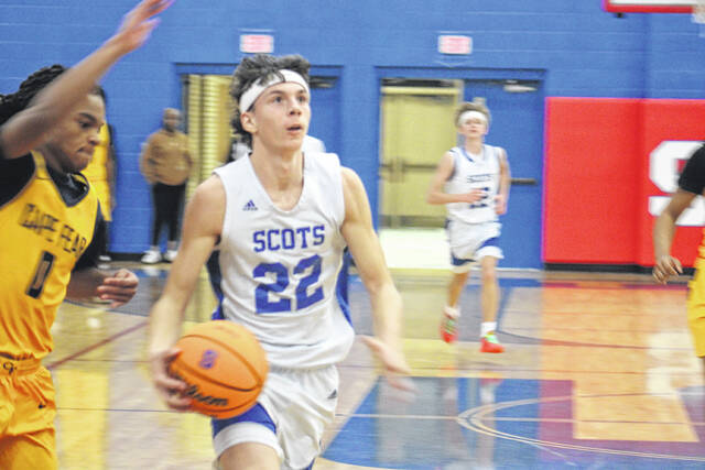 132094795_web1_IMG_4380
Scots junior Collin Hill (22) pushes the pace on a fast break as a Cape Fear defender reaches in on Jan.27, 2026.
Travis Petty Jr | The Laurinburg Exchange