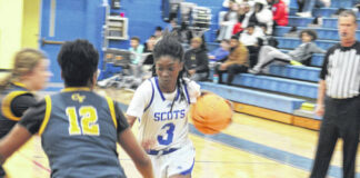 
			
				                                Scots freshman Amaria Bostick (3) maneuvers through Cape Fear defenders on Jan. 27, 2026. 
                                 Travis Petty Jr | The Laurinburg Exchange

			
		