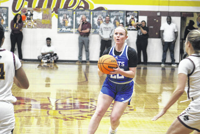 Scots junior Addison Ratley (22) prepares to shoot a 3-pointer against Lumberton on Feb. 10, 2026.
                                 Travis Petty Jr | The Laurinburg Exchange