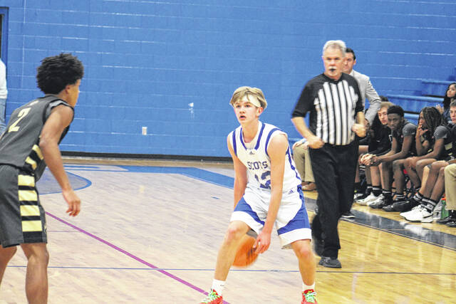 132155762_web1_IMG_4953
Scots sophomore guard Maddox McNickle (12) sizes up a Grays Creek defender on Feb. 9, 2026.
Travis Petty Jr | The Laurinburg Exchange