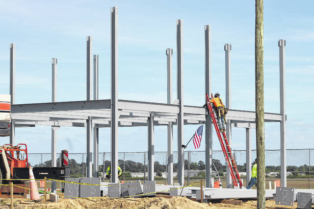 Attendees gather Thursday at Laurinburg-Maxton Airport as officials mark a construction milestone for the airports new 8,200-square-foot terminal during a ceremony highlighting ongoing progress on the $5.2 million project. The event featured remarks from local, state and federal leaders and the placement of a structural steel beam in the new buildings framework.
Tomeka Sinclair | The Laurinburg Exchange