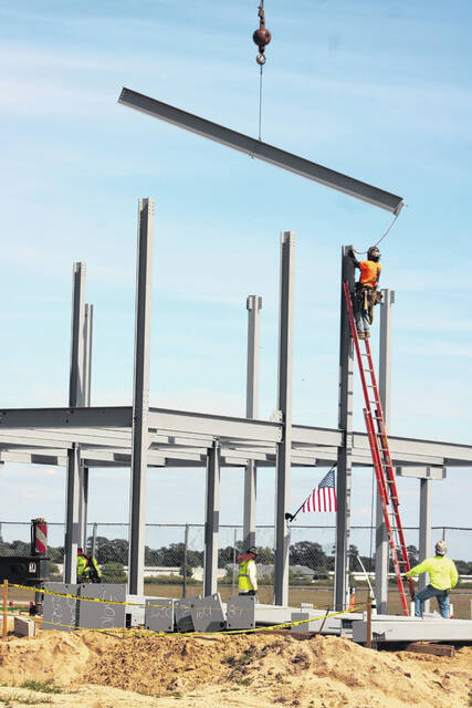 Attendees gather Thursday at Laurinburg-Maxton Airport as officials mark a construction milestone for the airports new 8,200-square-foot terminal during a ceremony highlighting ongoing progress on the $5.2 million project. The event featured remarks from local, state and federal leaders and the placement of a structural steel beam in the new buildings framework.
Tomeka Sinclair | The Laurinburg Exchange