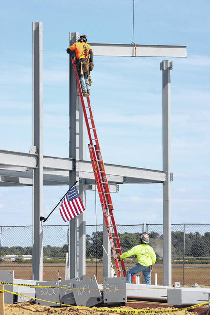 Attendees gather Thursday at Laurinburg-Maxton Airport as officials mark a construction milestone for the airports new 8,200-square-foot terminal during a ceremony highlighting ongoing progress on the $5.2 million project. The event featured remarks from local, state and federal leaders and the placement of a structural steel beam in the new buildings framework.
Tomeka Sinclair | The Laurinburg Exchange
