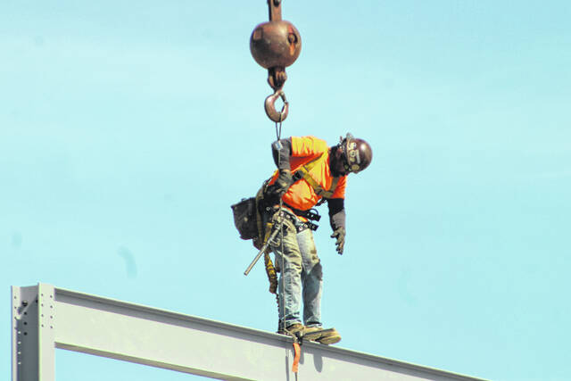 Attendees gather Thursday at Laurinburg-Maxton Airport as officials mark a construction milestone for the airports new 8,200-square-foot terminal during a ceremony highlighting ongoing progress on the $5.2 million project. The event featured remarks from local, state and federal leaders and the placement of a structural steel beam in the new buildings framework.
Tomeka Sinclair | The Laurinburg Exchange