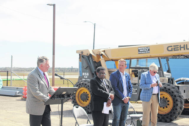 Attendees gather Thursday at Laurinburg-Maxton Airport as officials mark a construction milestone for the airports new 8,200-square-foot terminal during a ceremony highlighting ongoing progress on the $5.2 million project. The event featured remarks from local, state and federal leaders and the placement of a structural steel beam in the new buildings framework.
Tomeka Sinclair | The Laurinburg Exchange