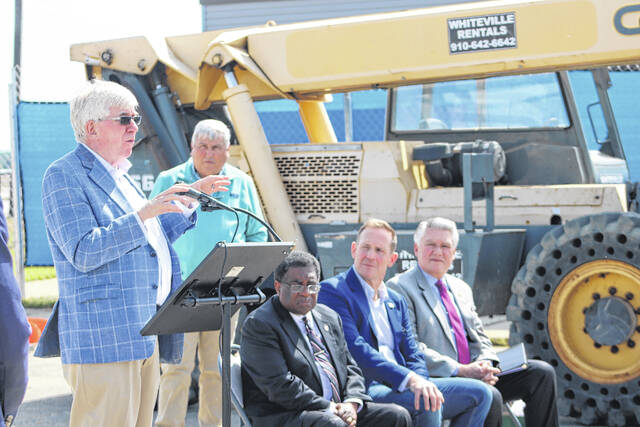 Attendees gather Thursday at Laurinburg-Maxton Airport as officials mark a construction milestone for the airports new 8,200-square-foot terminal during a ceremony highlighting ongoing progress on the $5.2 million project. The event featured remarks from local, state and federal leaders and the placement of a structural steel beam in the new buildings framework.
Tomeka Sinclair | The Laurinburg Exchange