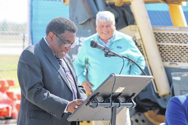 Attendees gather Thursday at Laurinburg-Maxton Airport as officials mark a construction milestone for the airports new 8,200-square-foot terminal during a ceremony highlighting ongoing progress on the $5.2 million project. The event featured remarks from local, state and federal leaders and the placement of a structural steel beam in the new buildings framework.
Tomeka Sinclair | The Laurinburg Exchange