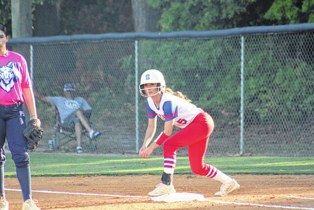 Scotland senior Addison Lewis (5) looks to steal from first base against Punrell Swett on April 17, 2026. 
                                 Travis Petty Jr | The Laurinburg Exchange