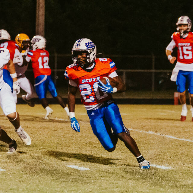 Scotland running back Michael McLean (20) carries the football against Cape Fear on Nov. 1, 2025. McLean recently received an offer from Marshall University.
                                 Courtesy Photo