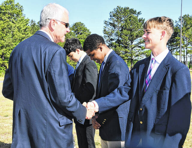 State Superintendent Mo Green and Golden LEAF Foundation President and CEO Scott Hamilton toured classrooms, met with staff and observed student engagement during their visit. They were welcomed on campus by school ambassadors, the Blue Blazers and the school marching band.
                                 Courtesy photo | Scotland County Schools