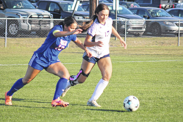 Scotland senior Honey Freeman (13) battles for the ball against a Purnell Swett defender on April 22, 2026.
                                 Travis Petty Jr | The Laurinburg Exchange
