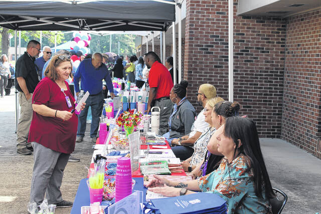 Tables set up inside the Health and Human Services building showcase county programs and services during Integrated Services Day Friday in Scotland County.
                                 Tomeka Sinclair | The Laurinburg Exchange