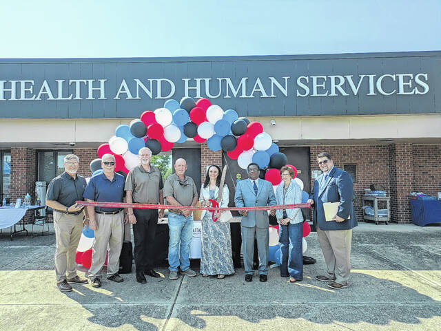 County officials and staff gather Friday for a ribbon cutting marking the launch of the consolidated Health and Human Services agency in Scotland County.
                                 Tomeka Sinclair | The Laurinburg Exchange