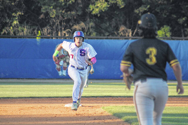 Scotland senior Dawson Williams (7) sprints to third base in the second inning against Montgomery Central on April 27, 2026. 
                                 Travis Petty Jr | The Laurinburg Exchange