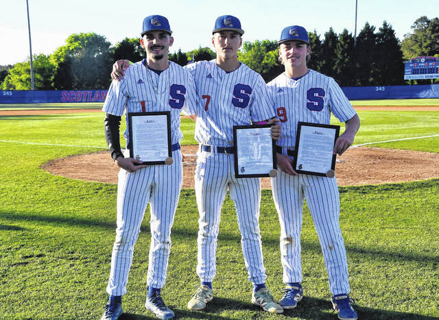 Scotland seniors Kaden Hunsucker, left, Dawson Williams and Blaine Callahan pose for a photo on Senior Night on April 27, 2026. 
                                 Courtesy Photo