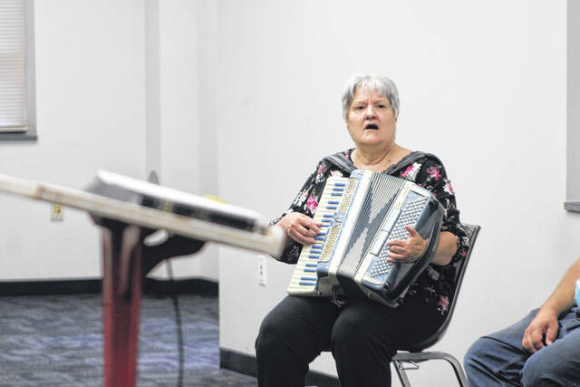 Residents, clergy and local officials gather inside the Scotland County Courthouse for the National Day of Prayer after rain forced the annual observance indoors.
                                 Tomeka Sinclair | The Laurinburg Exchange