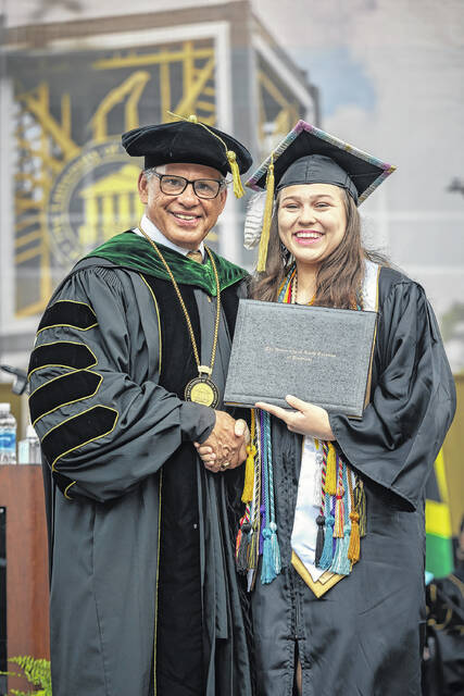Students take part in Spring Commencement exercises at the University of North Carolina at Pembroke, where 1,173 graduates were honored across undergraduate and graduate programs. Former NASA astronaut and keynote speaker Dr. John Herrington encouraged graduates to embrace resilience, adaptability and purpose as they enter the next chapter of their lives.
                                 Courtesy photo | UNCP