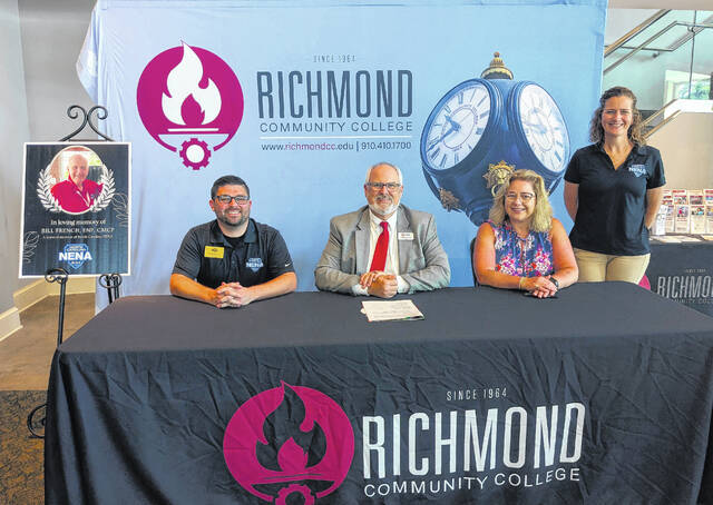 North Carolina NENA President Travis Essic is shown with Richmond Community College President Brent Barbee, Dr. Wendy Jordan with the RichmondCC Foundation and 911 Communications & Operations Program Director at RichmondCC Jamison Sears.
Courtesy photo | RichmondCC