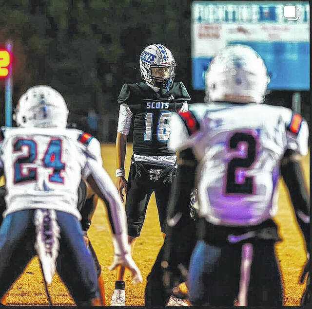 Scotland senior quarterback Collin Hill (16) stands behind center versus the Terry Sanford Bulldogs in the second round of the playoffs on Nov. 14, 2025 at Pate Stadium.
                                 Courtesy Photo