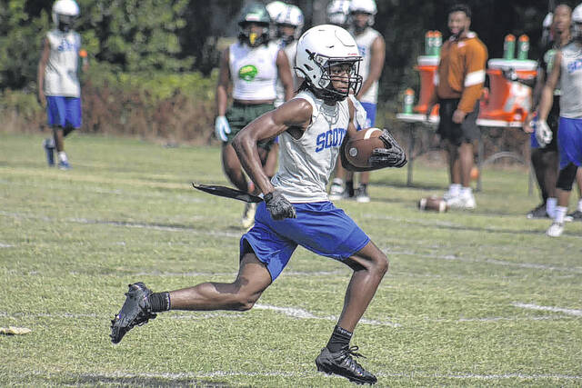 Scotland junior wide receiver Nazire Campbell runs with the football during summer workouts on June 10, 2026.
Travis Petty Jr | The Laurinburg Exchange